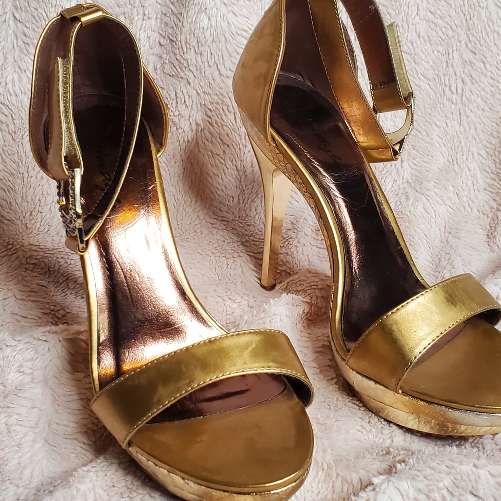 Gold high heel stilettos